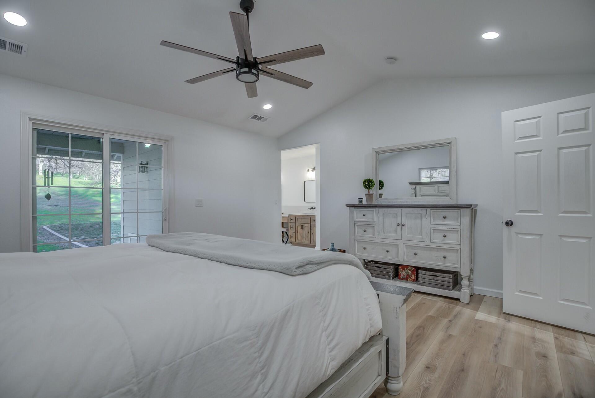 14300 Molluc Drive Red Bluff, CA 96080 - Photo 41 of 48 a bedroom with a bed and a window