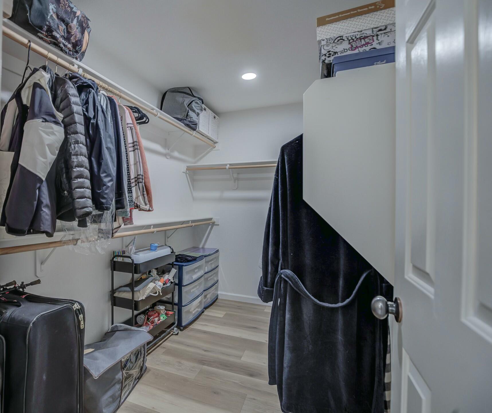 14300 Molluc Drive Red Bluff, CA 96080 - Photo 45 of 48 a view of walk in closet with clothes and shoes