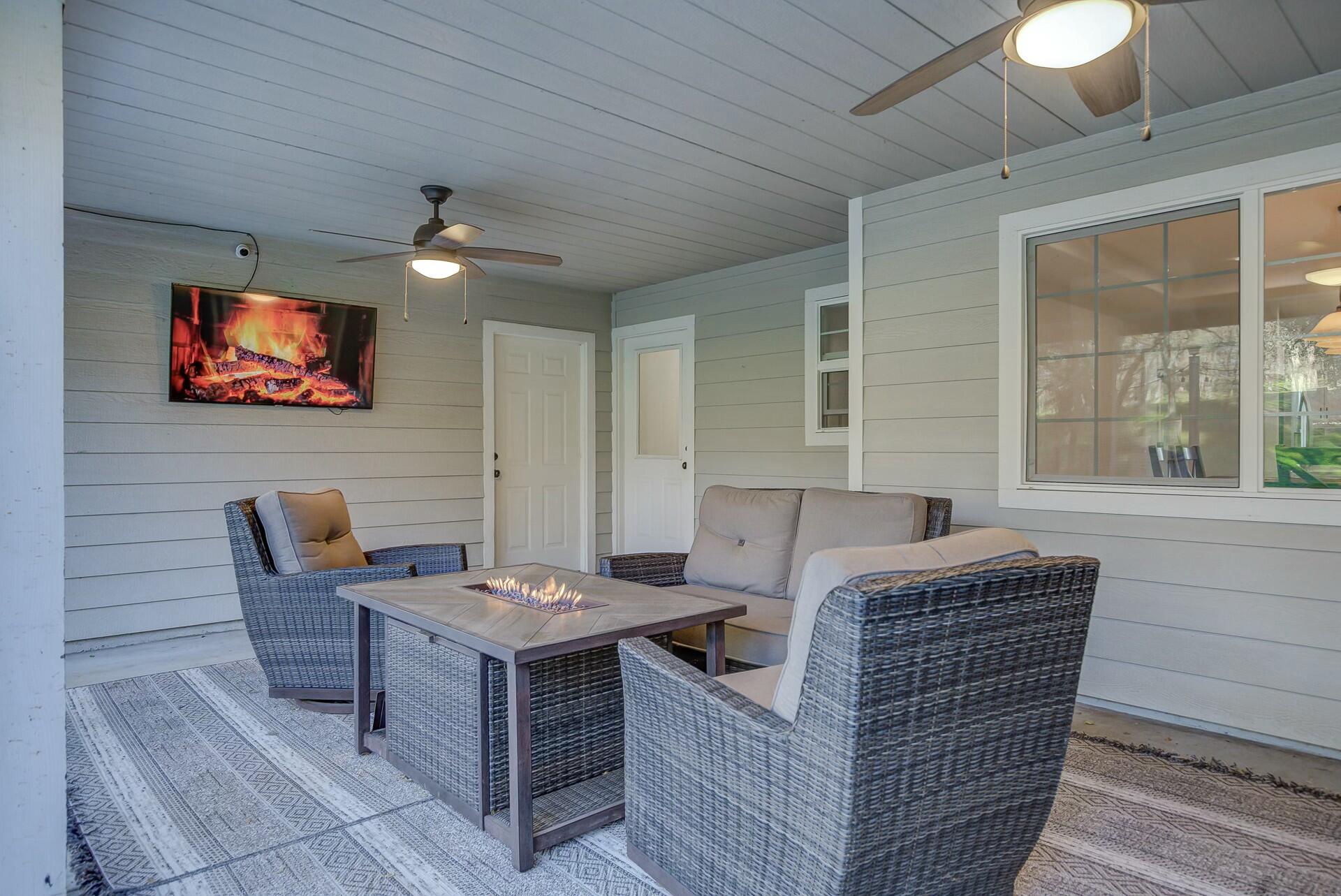 14300 Molluc Drive Red Bluff, CA 96080 - Photo 46 of 48 a living room with furniture and a flat screen tv