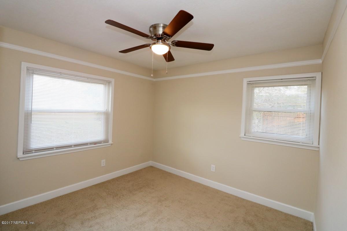 8584 Old Plank Road Jacksonville, FL 32220 - Photo 8 of 23 an empty room with a window