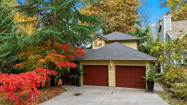 a front view of a house with a garage