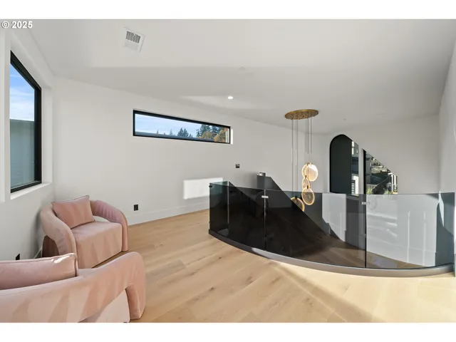 a bathroom with a granite countertop sink a toilet and a tub