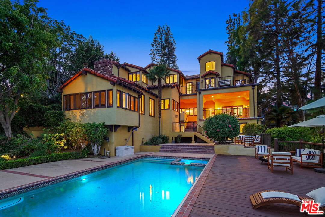16814 Oak View Drive Encino, CA 91436 - Photo 1 of 49 a view of a house with swimming pool and sitting area