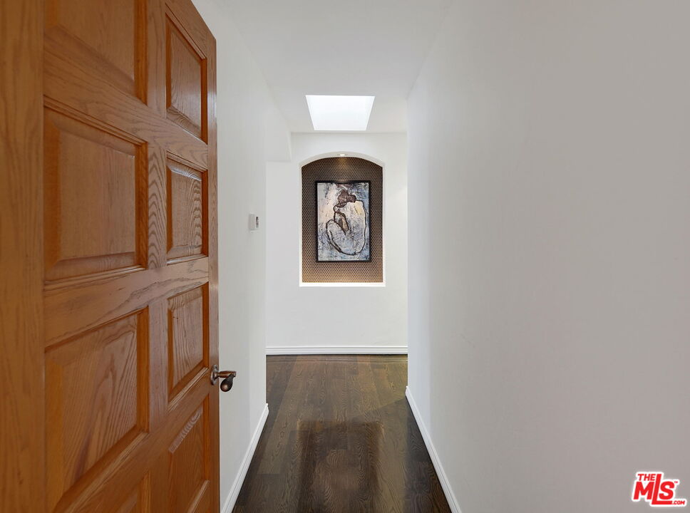 16814 Oak View Drive Encino, CA 91436 - Photo 19 of 49 a hallway with windows