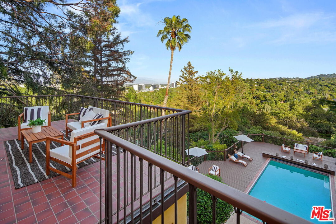 16814 Oak View Drive Encino, CA 91436 - Photo 26 of 49 a view of a balcony with chairs