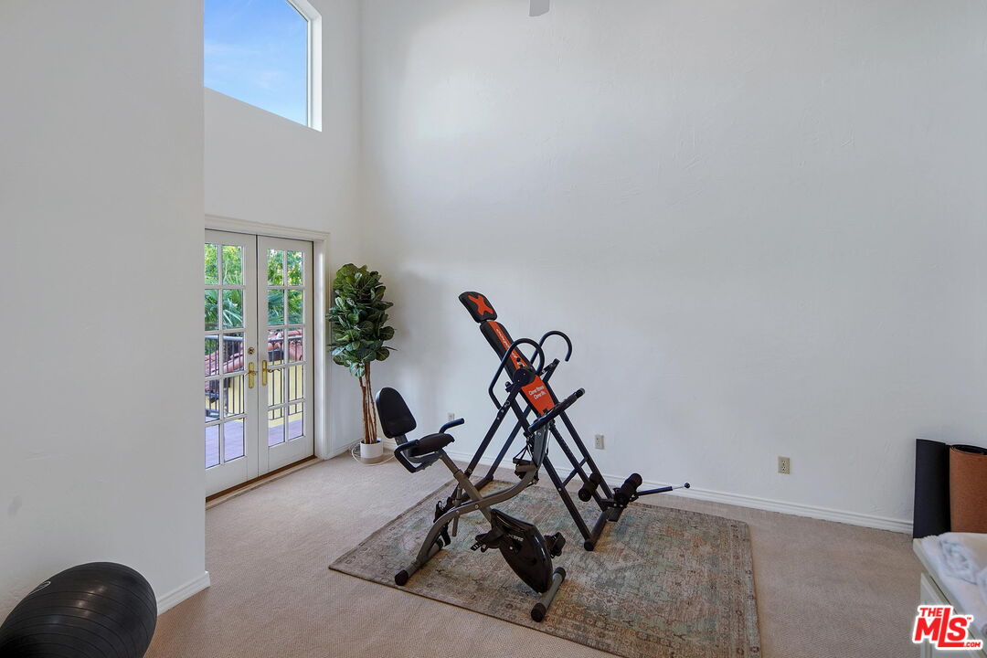 16814 Oak View Drive Encino, CA 91436 - Photo 27 of 49 a view of a room with gym equipment