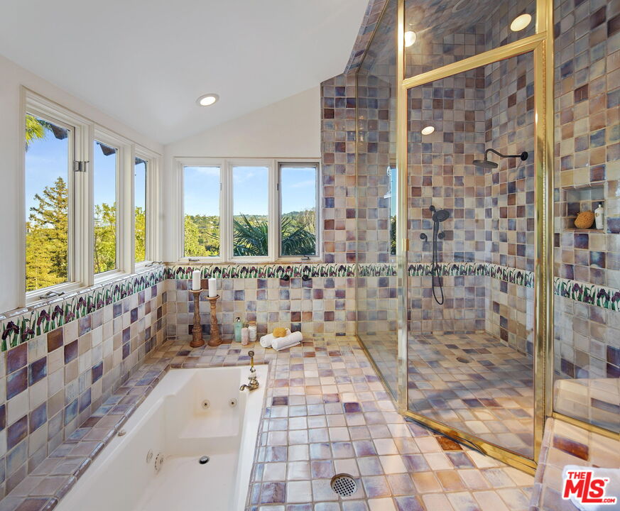 16814 Oak View Drive Encino, CA 91436 - Photo 29 of 49 a large spacious bathroom with a bathtub and a shower