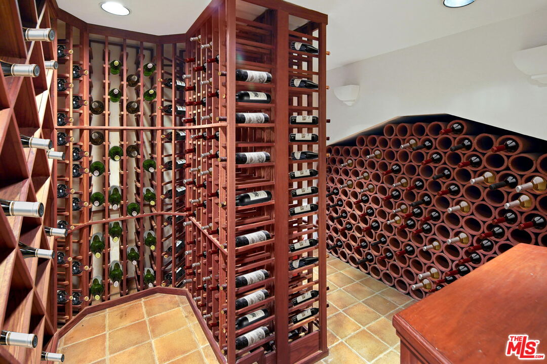 16814 Oak View Drive Encino, CA 91436 - Photo 36 of 49 a black and white curtain