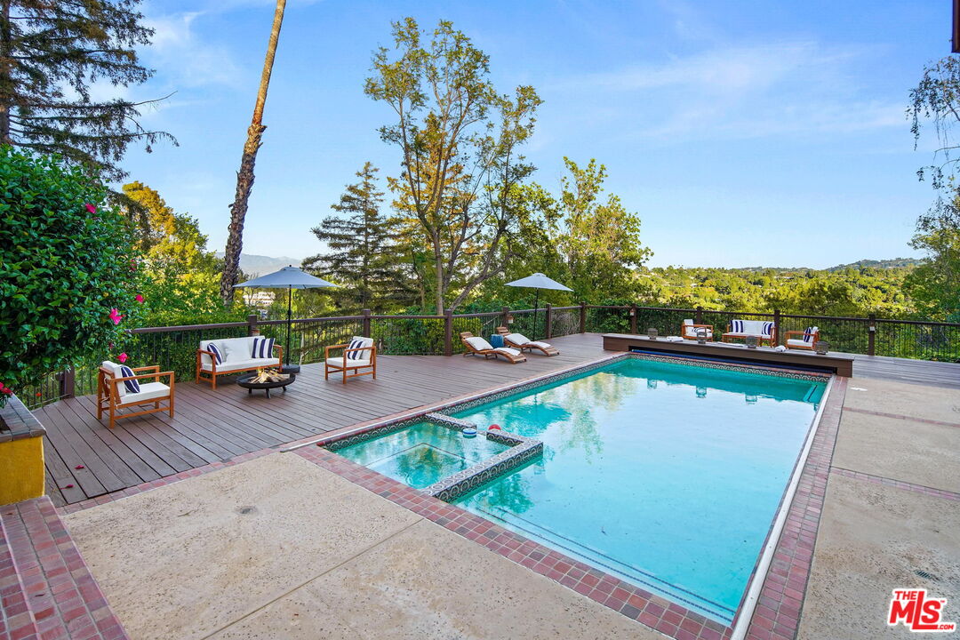 16814 Oak View Drive Encino, CA 91436 - Photo 40 of 49 swimming pool view with a seating space