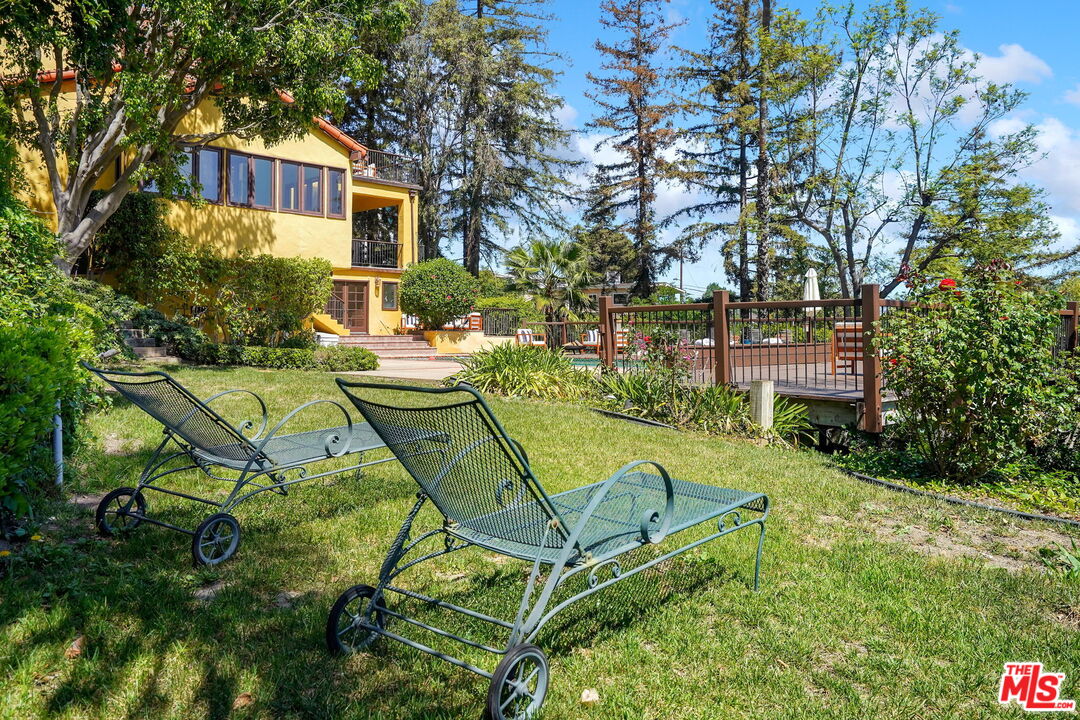 16814 Oak View Drive Encino, CA 91436 - Photo 42 of 49 a view of a house with backyard and sitting area