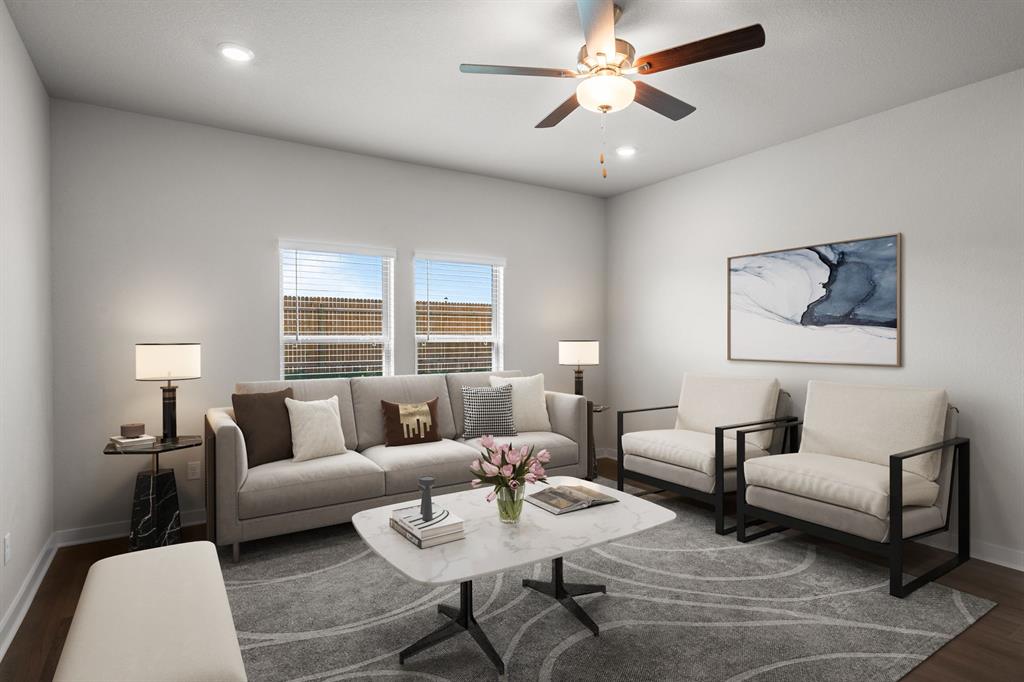 177 Sleep Hollow Jarrell, TX 76537 - Photo 4 of 24 Spacious interior featuring wood-finish flooring, recessed lighting, and a ceiling fan