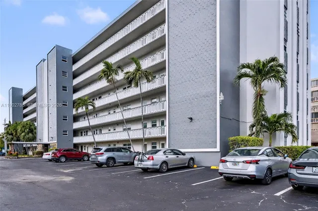 a cars parked in front of a building