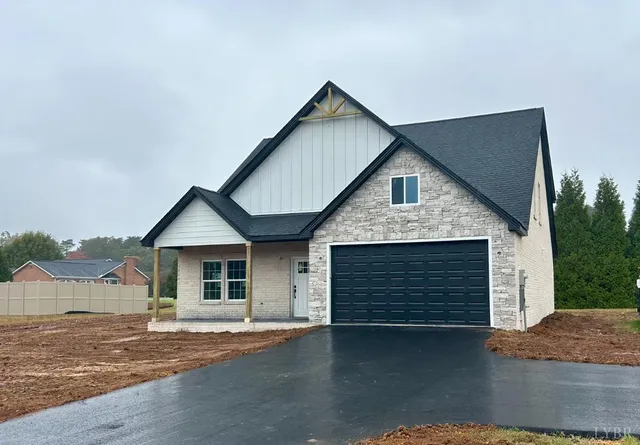 a front view of a house with a garage