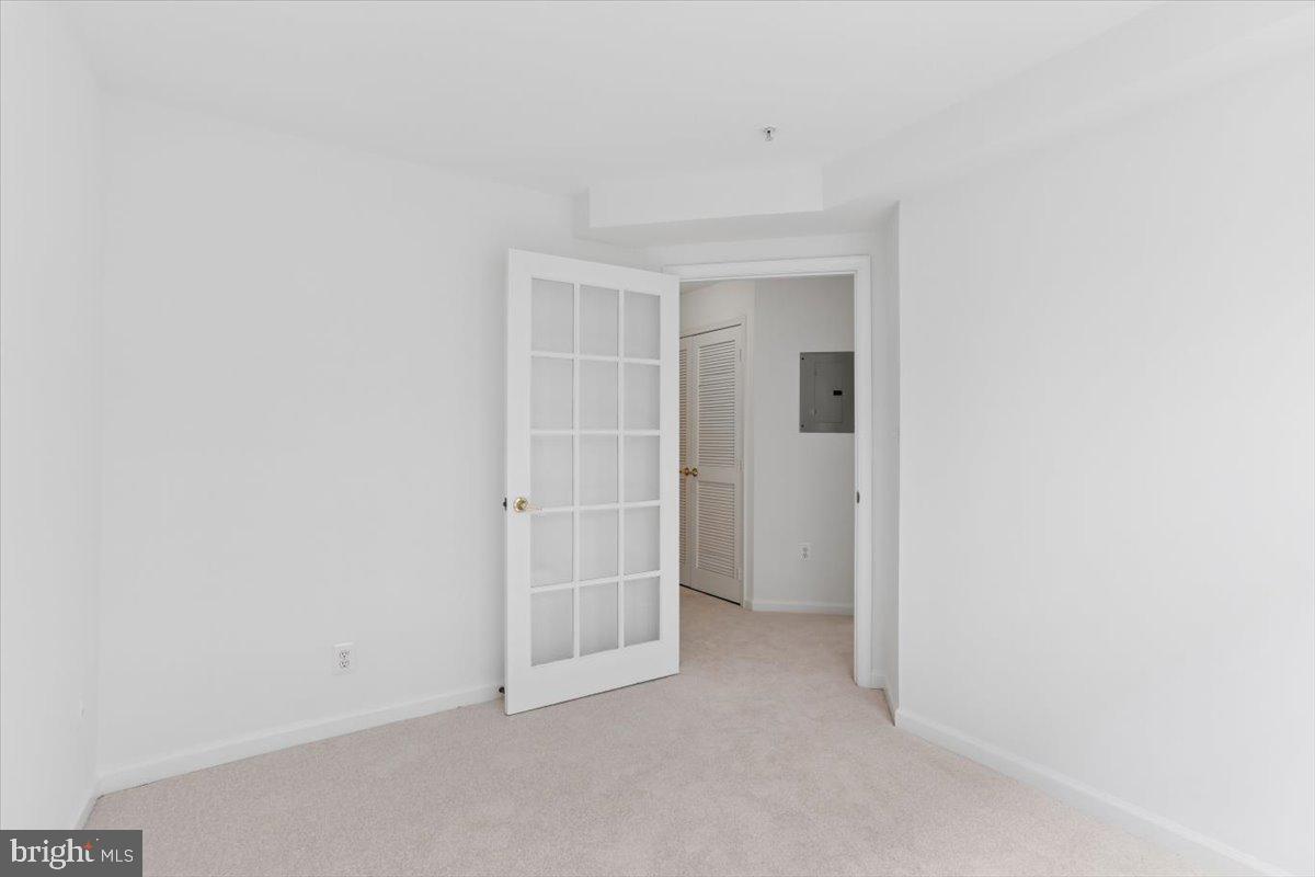 631 Constellation Square Southeast, Unit D Leesburg, VA 20175 - Photo 13 of 22 an empty room with closet