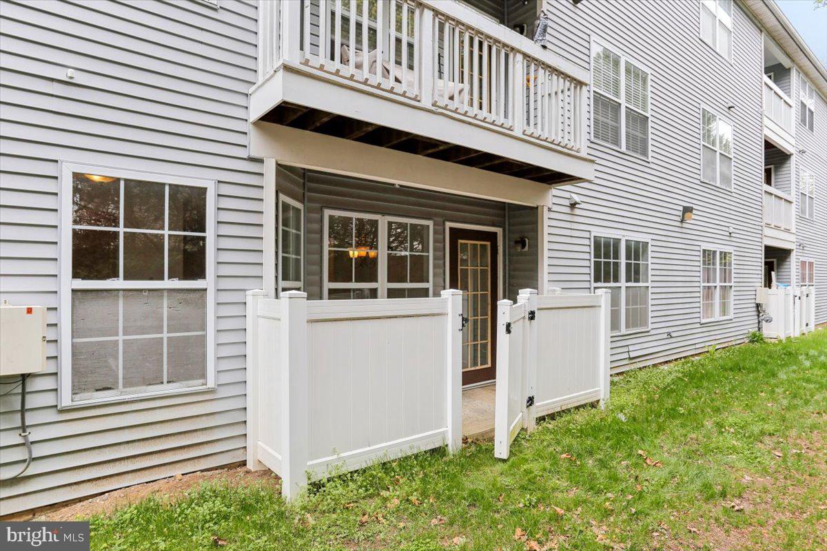 631 Constellation Square Southeast, Unit D Leesburg, VA 20175 - Photo 20 of 22 a view of a house with a large window