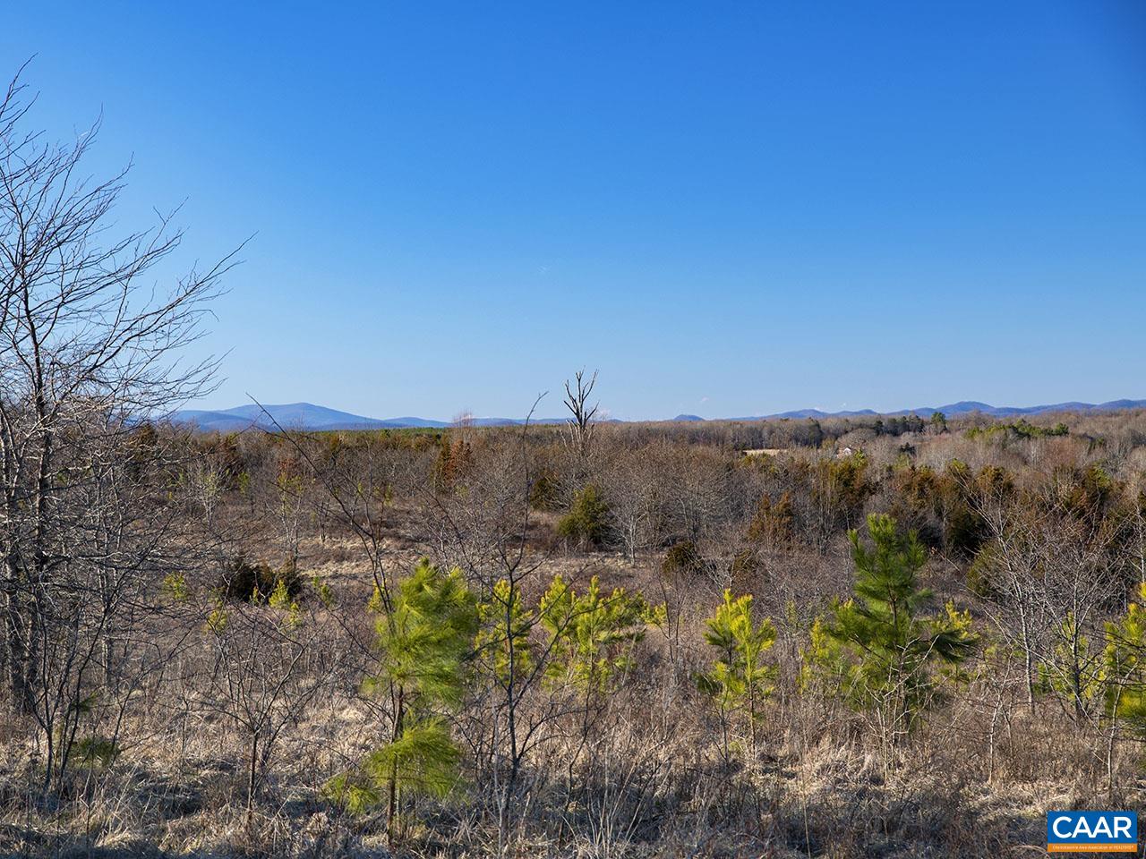 Tbd-1 Manteo Road Buckingham, VA 23921 - Photo 2 of 10 a view of a lake with a mountain in the background