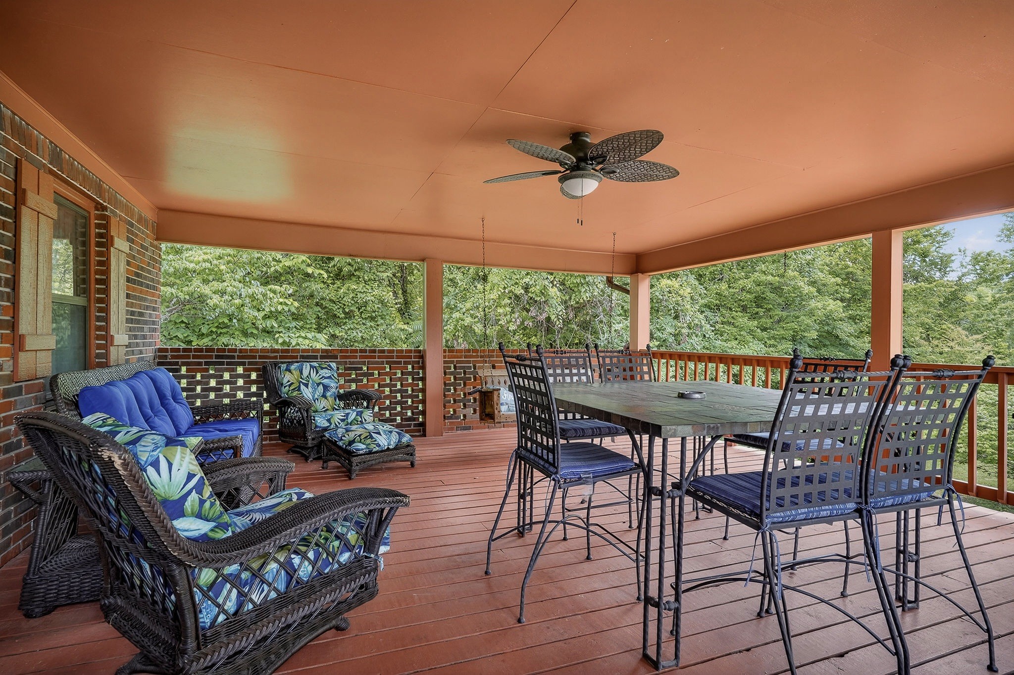 5642 Pates Ford Road Smithville, TN 37166 - Photo 10 of 32 a view of a patio with a table chairs and a backyard