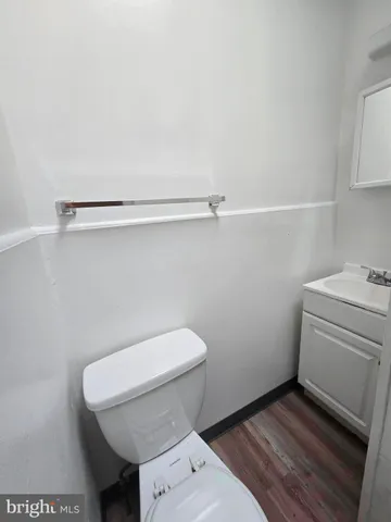 a bathroom with a sink and toilet