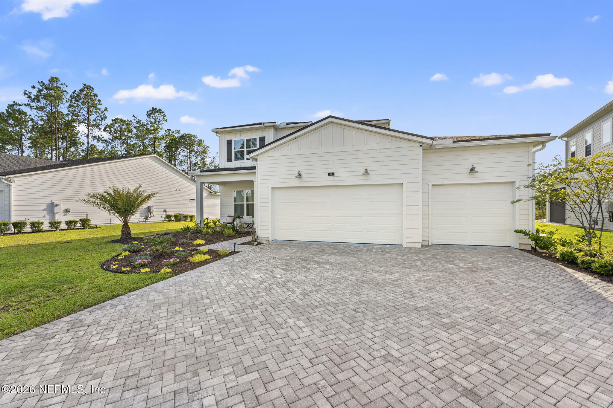 101 Elm Br Road St. Johns, FL 32259 - Photo 2 of 77 a front view of a house with a garden and yard