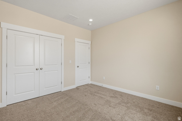 157 West 100 South Joseph, UT 84739 - Photo 20 of 30 Unfurnished bedroom with carpet flooring, a closet, and recessed lighting