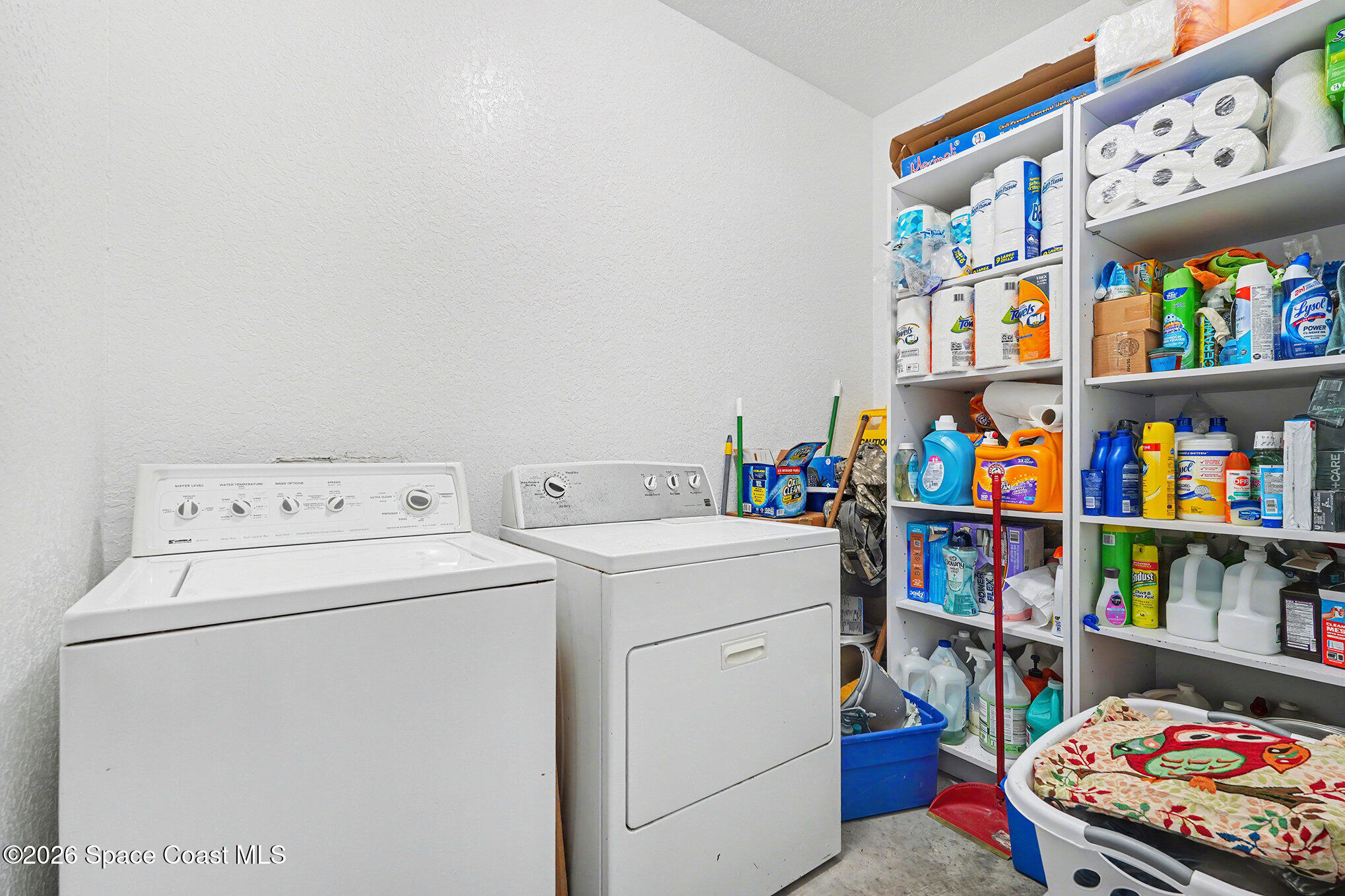 4960 Dixie Way Mims, FL 32754 - Photo 28 of 29 a storage room with washer and dryer