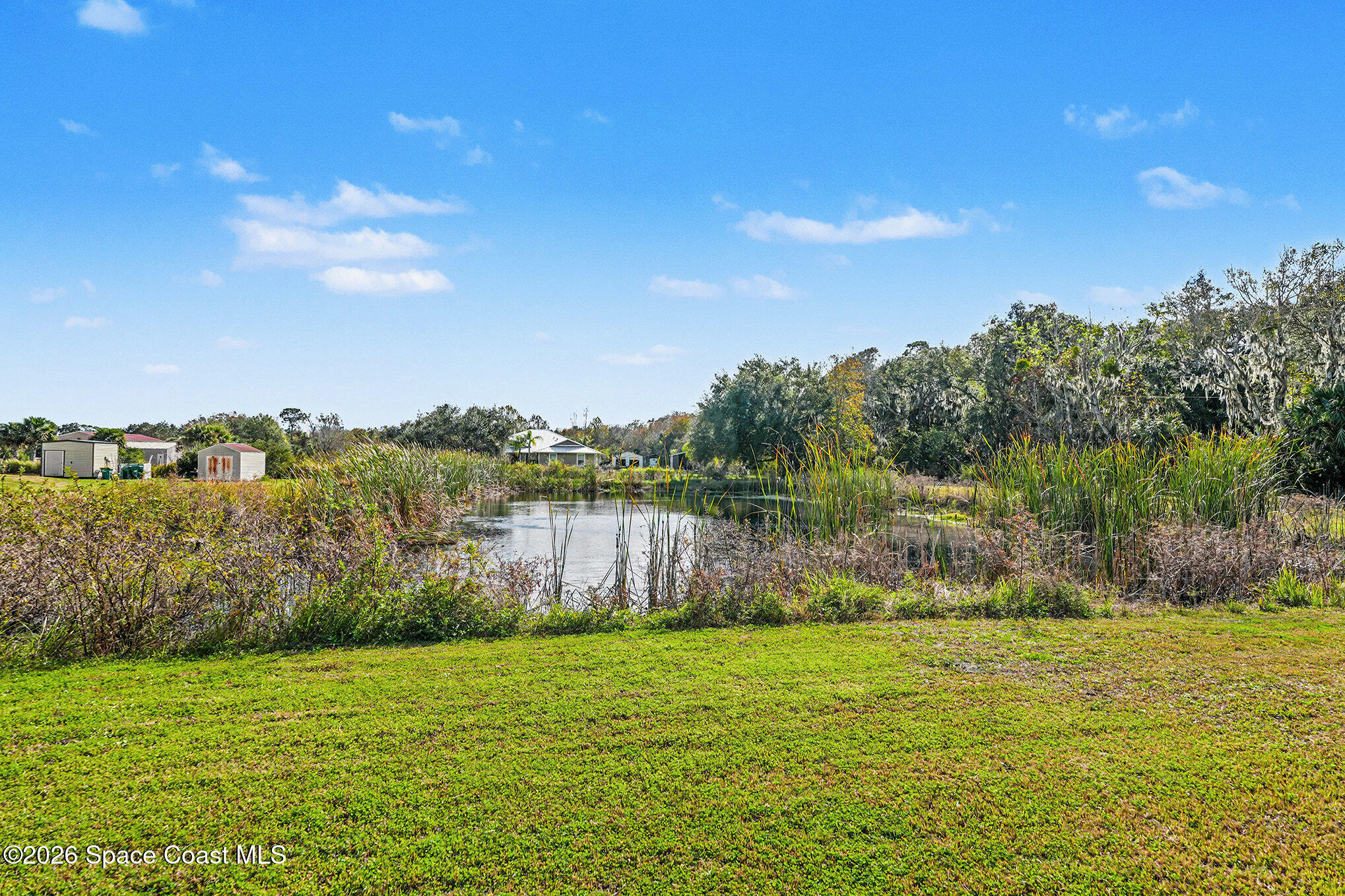 4960 Dixie Way Mims, FL 32754 - Photo 6 of 29 a view of a lake view
