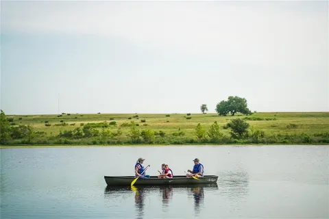 an outdoor space with lake view and mountain view