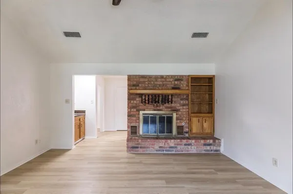 a living room with a fireplace