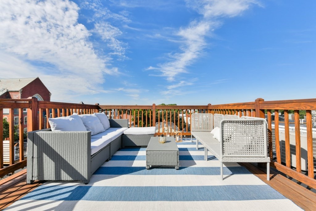 5 Grimes Street, Unit 3 Boston, MA 02127 - Photo 2 of 16 a terrace with sitting area