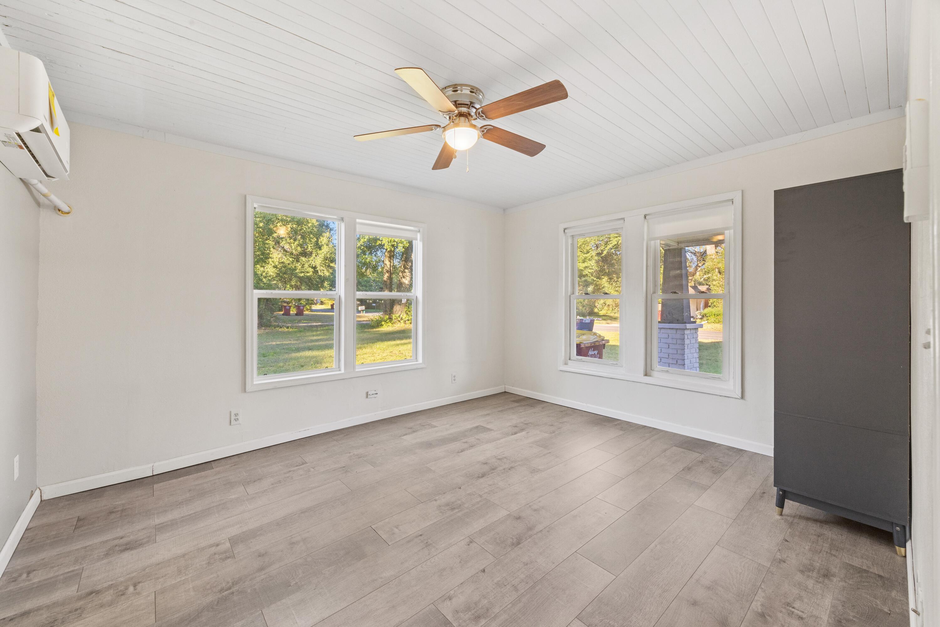 198 East 1st Avenue Crestview, FL 32536 - Photo 14 of 43 a view of an empty room with a window