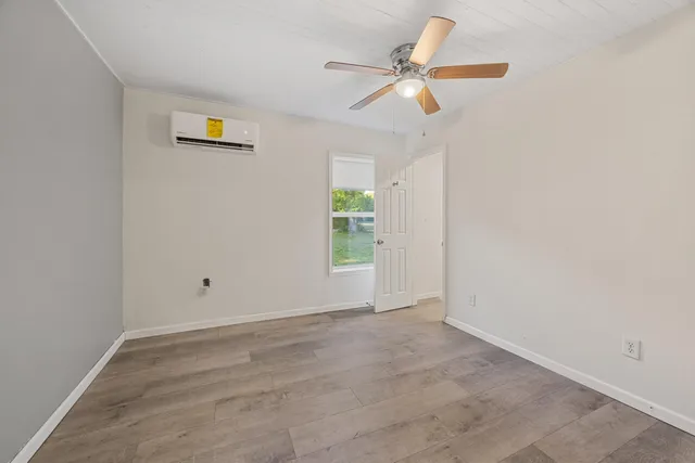 a bathroom with a toilet sink and shower