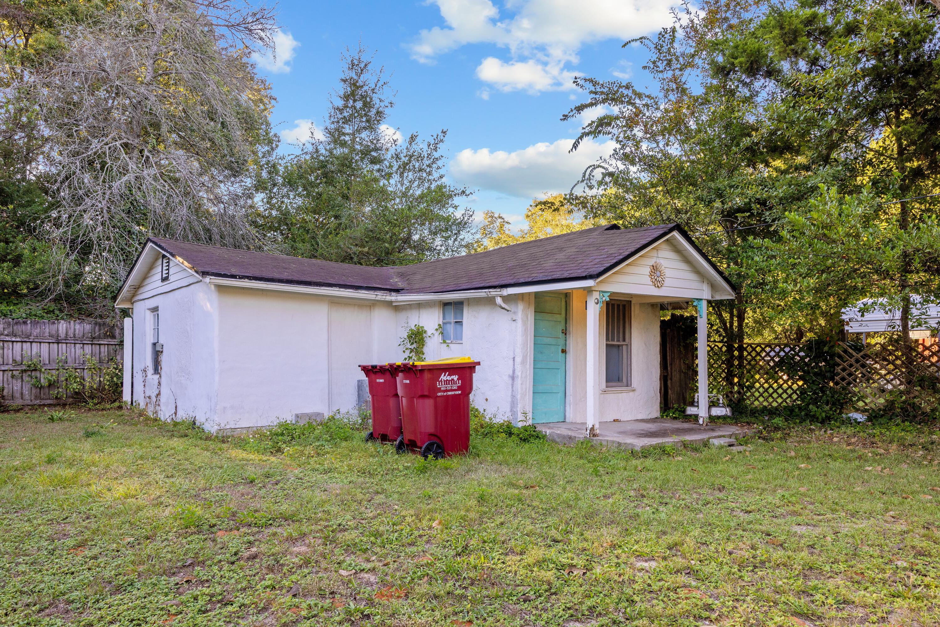 198 East 1st Avenue Crestview, FL 32536 - Photo 38 of 43 a view of a house with backyard