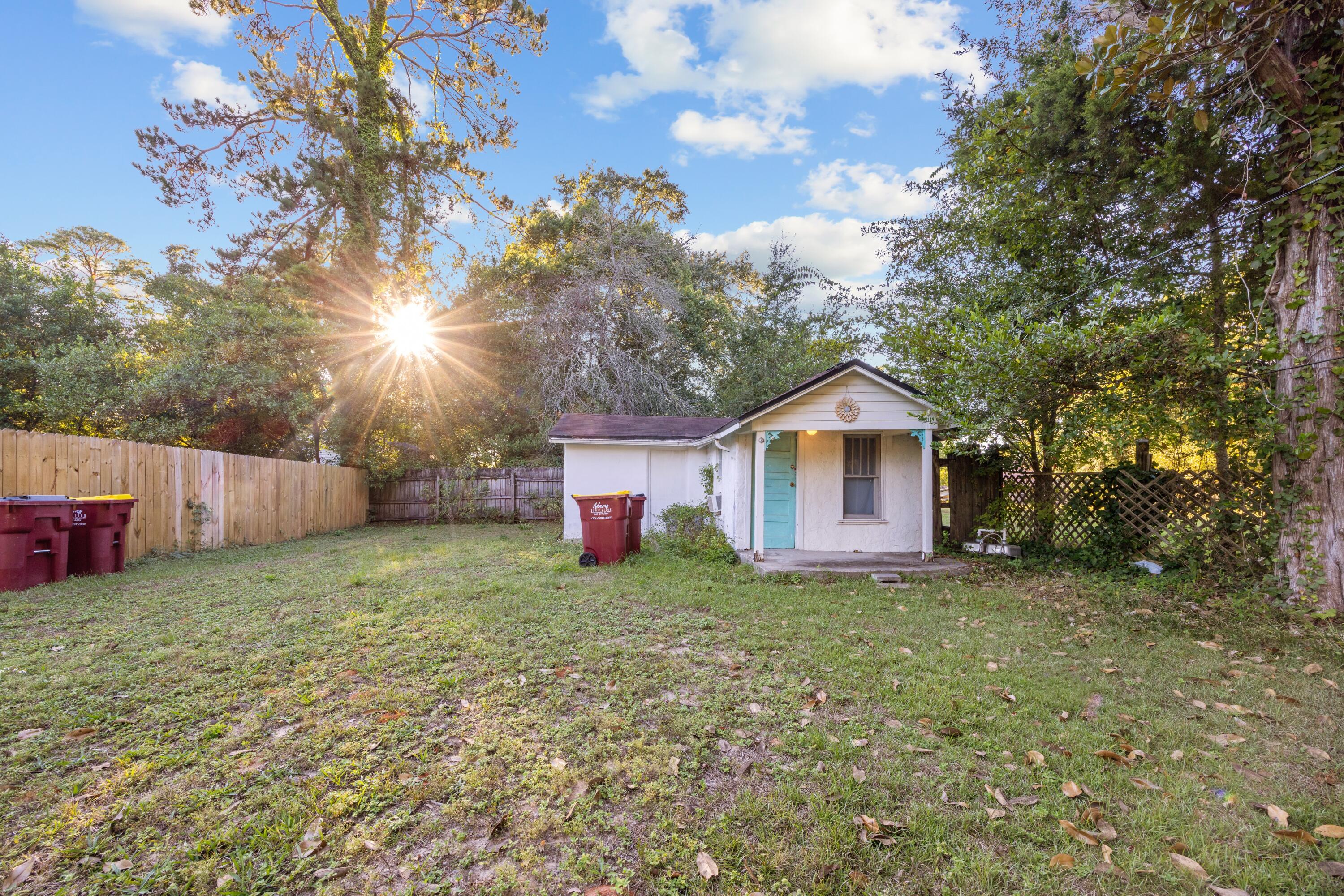 198 East 1st Avenue Crestview, FL 32536 - Photo 39 of 43 a house with a yard