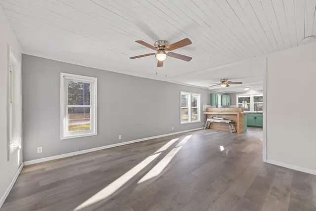 a living room with furniture and window