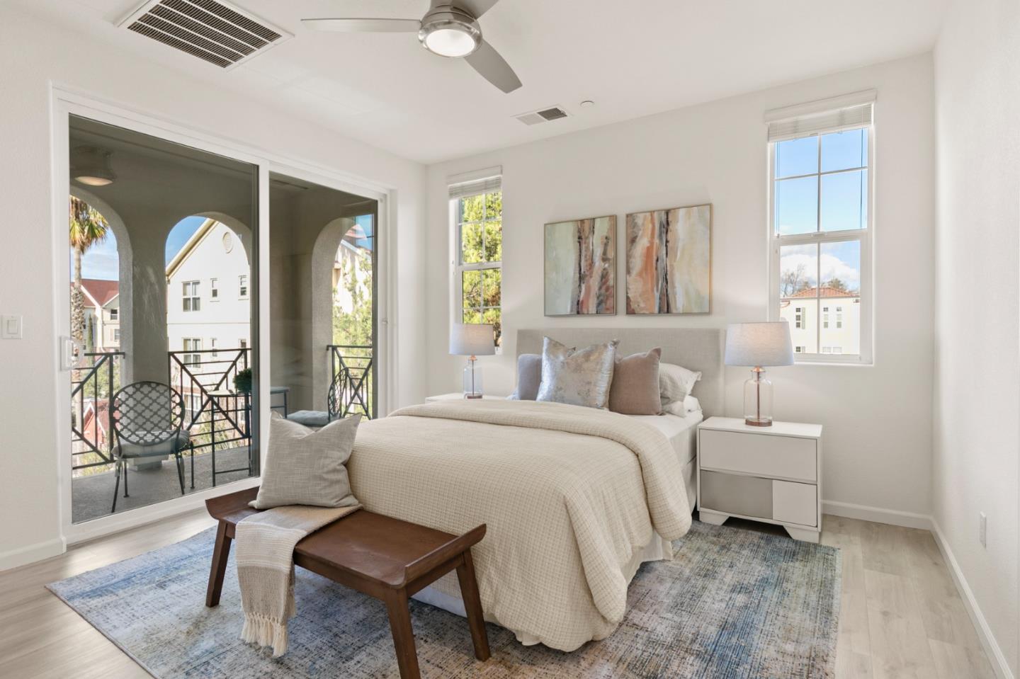 39829 Pelton Terrace Newark, CA 94560 - Photo 11 of 20 a bedroom with a bed and a large window with balcony view