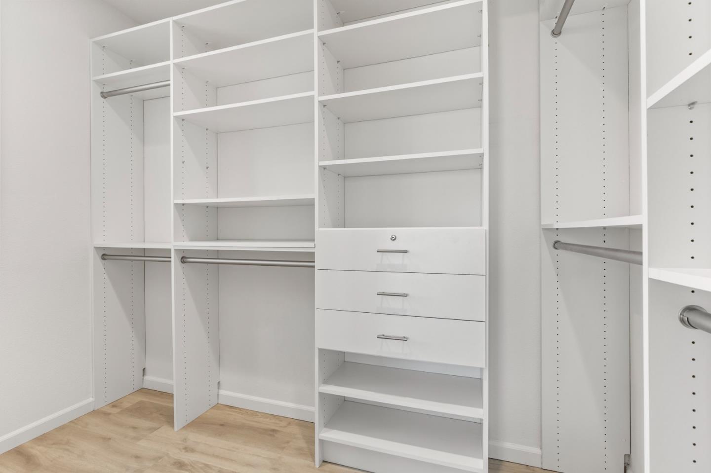 39829 Pelton Terrace Newark, CA 94560 - Photo 13 of 20 a view of walk in closet with empty racks