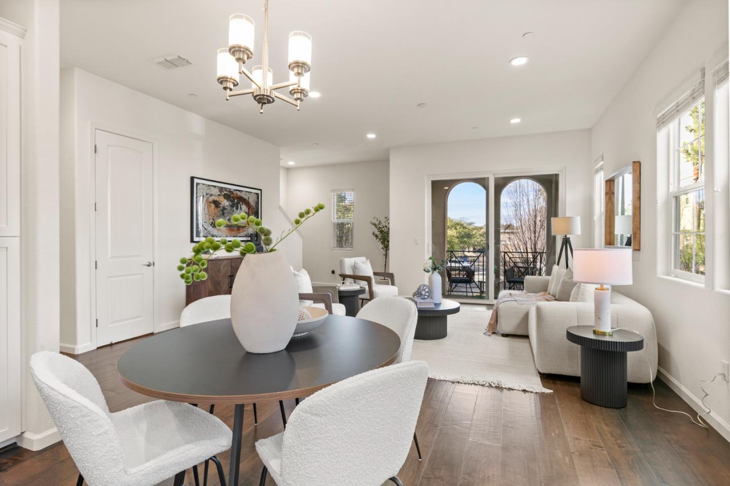 39829 Pelton Terrace Newark, CA 94560 - Photo 7 of 20 a living room with furniture potted plant and chandelier