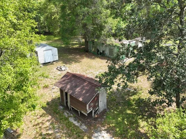 a view of a back yard of the house