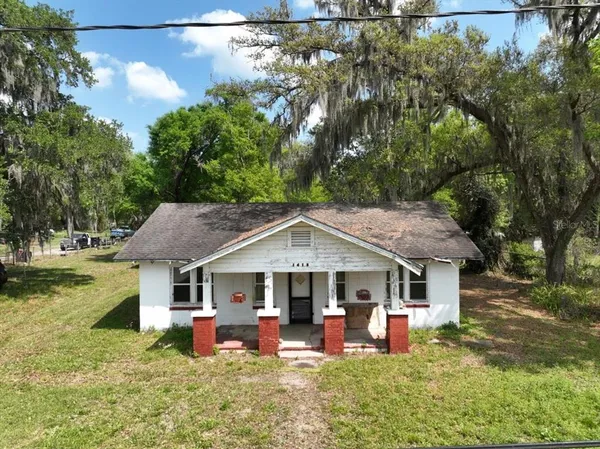 aerial view of a house with garden