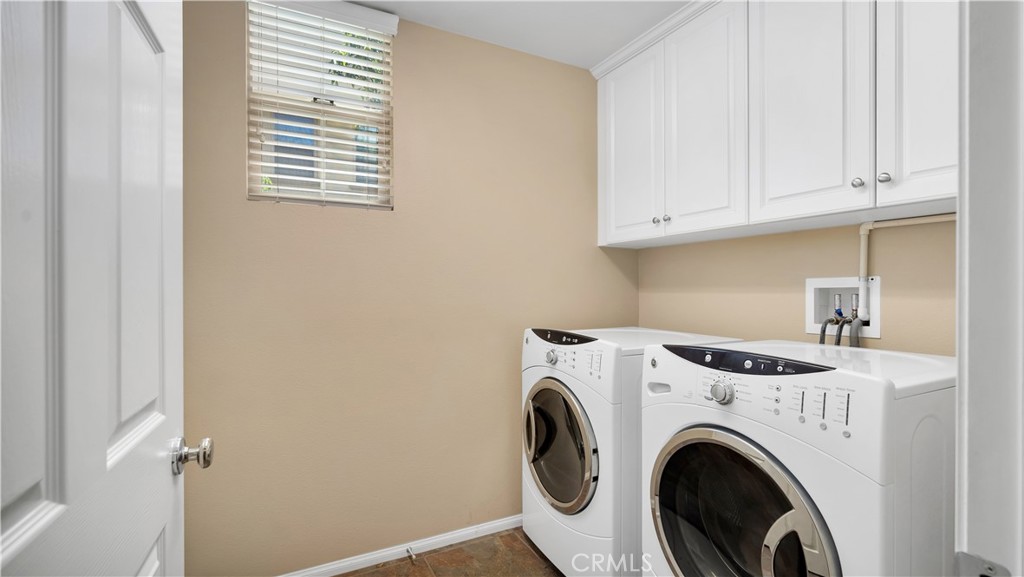 66 Full Moon Irvine, CA 92618 - Photo 11 of 32 a utility room with dryer and washer