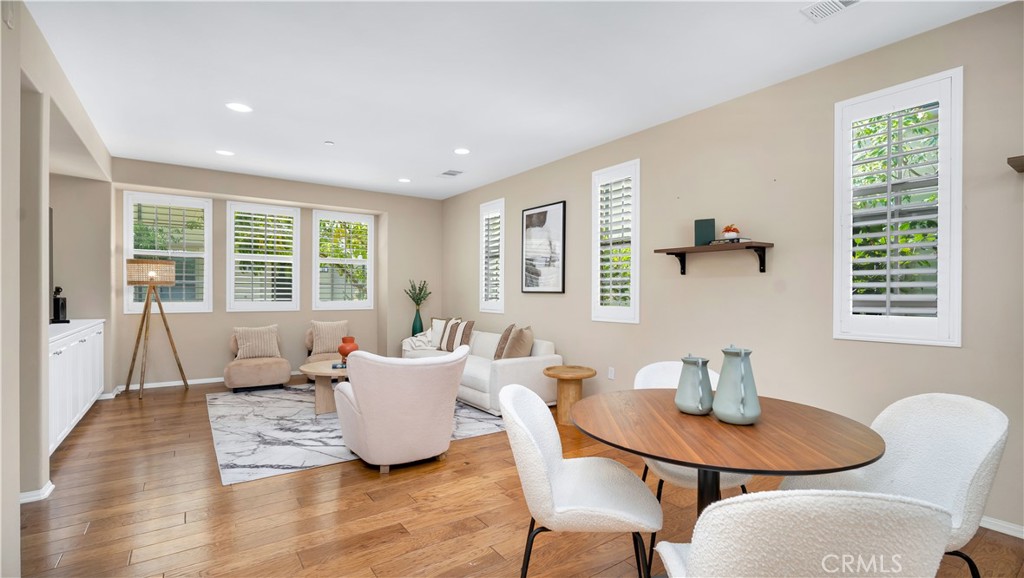 66 Full Moon Irvine, CA 92618 - Photo 13 of 32 a living room with furniture and a window