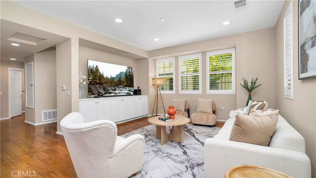66 Full Moon Irvine, CA 92618 - Photo 22 of 32 a living room with furniture and a large window
