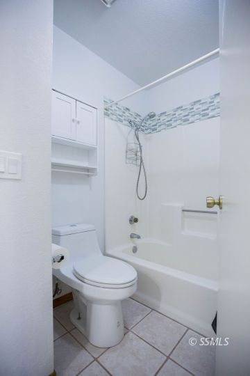 207 East Upjohn Avenue Ridgecrest, CA 93555 - Photo 20 of 20 a bathroom with a toilet and a shower