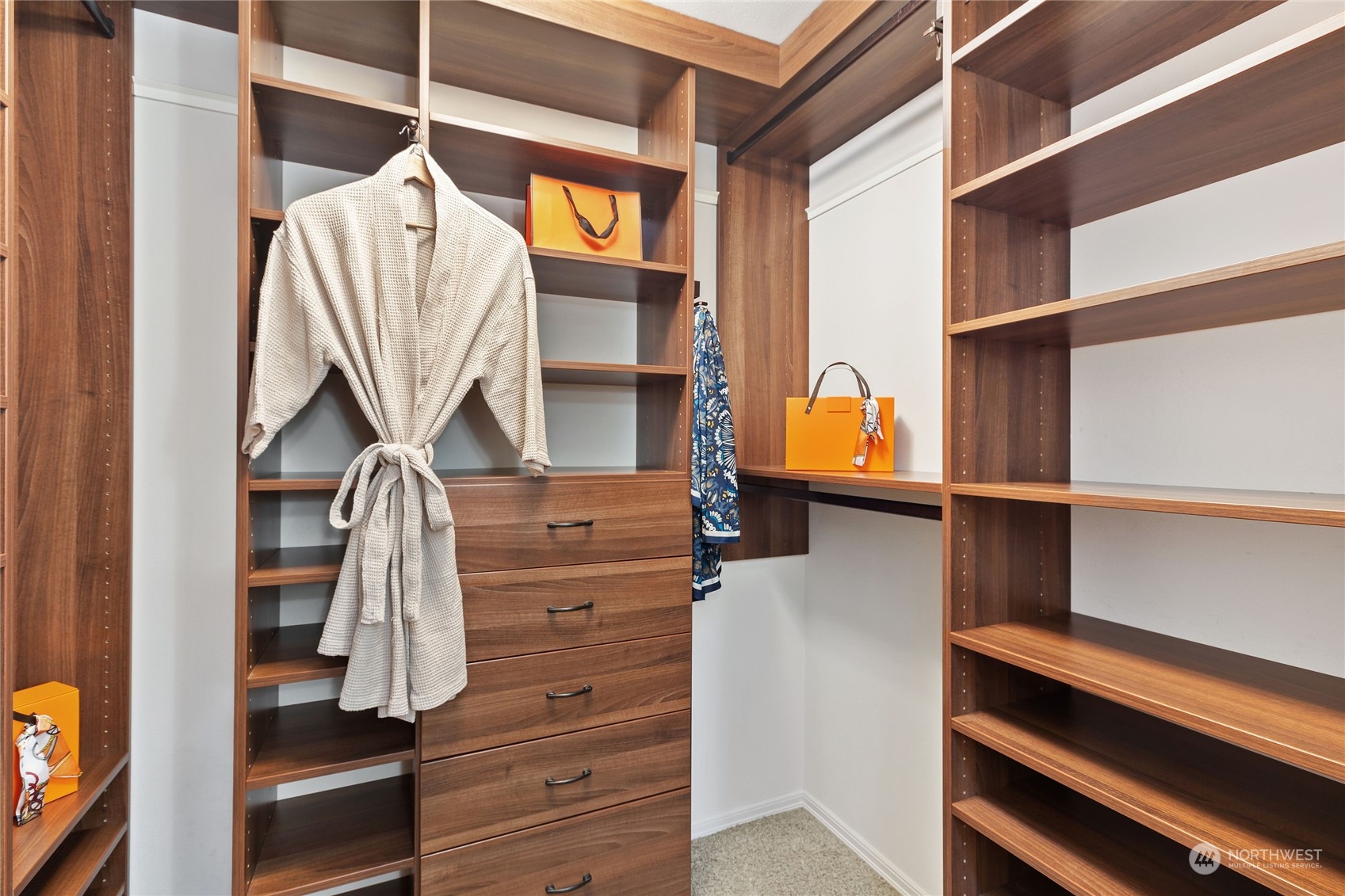 21020 49th Avenue Southeast Bothell, WA 98021 - Photo 26 of 39 a view of walk in closet with clothes and shoes