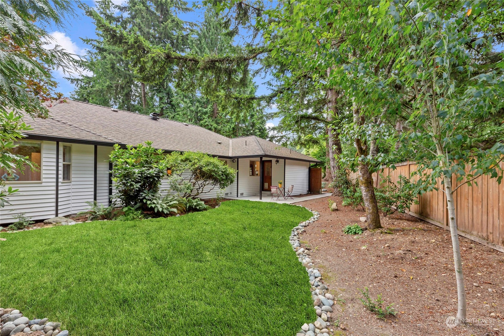 21020 49th Avenue Southeast Bothell, WA 98021 - Photo 37 of 39 a front view of a house with garden