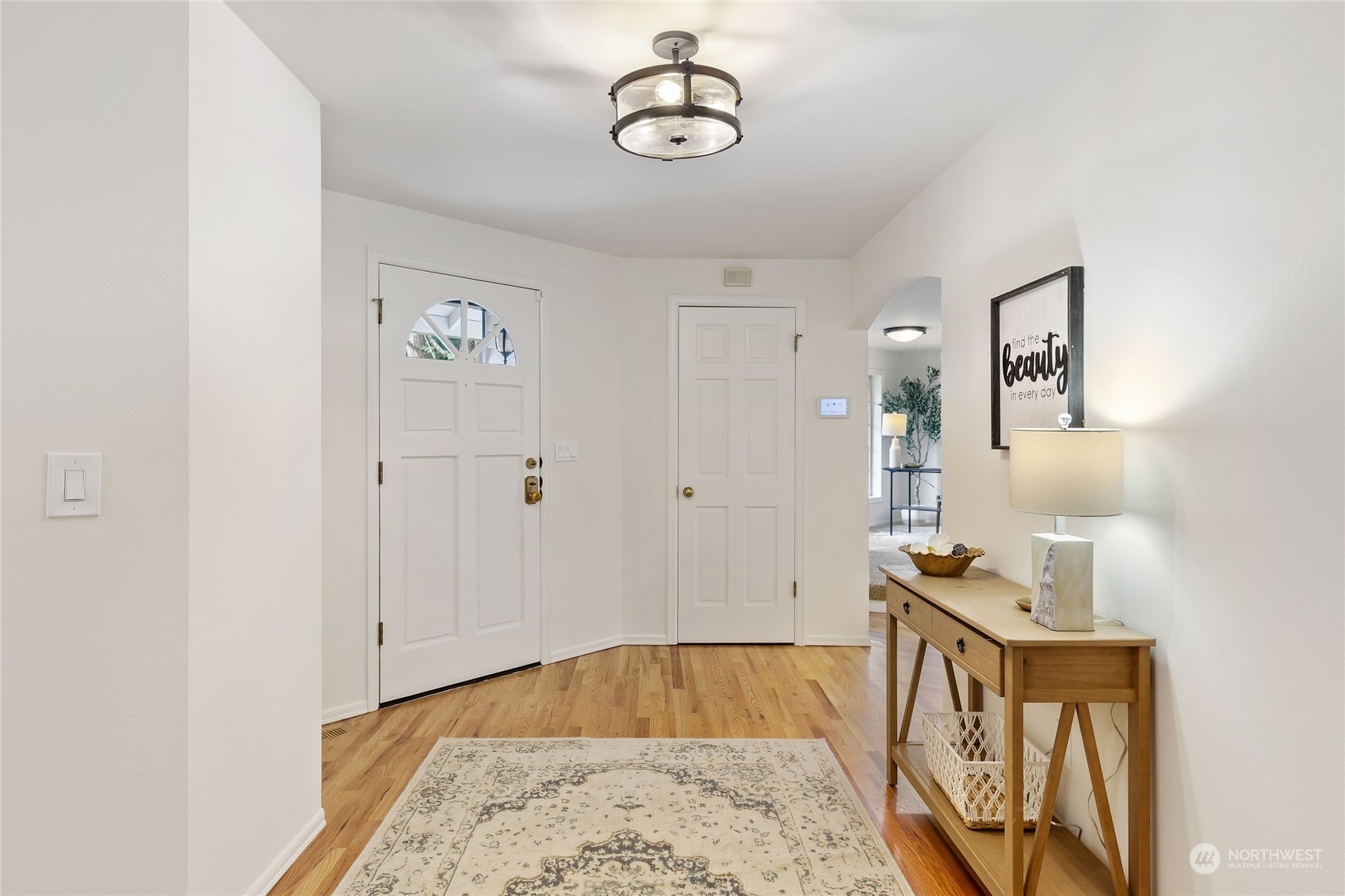 21020 49th Avenue Southeast Bothell, WA 98021 - Photo 6 of 39 a view of an entryway with wooden floor