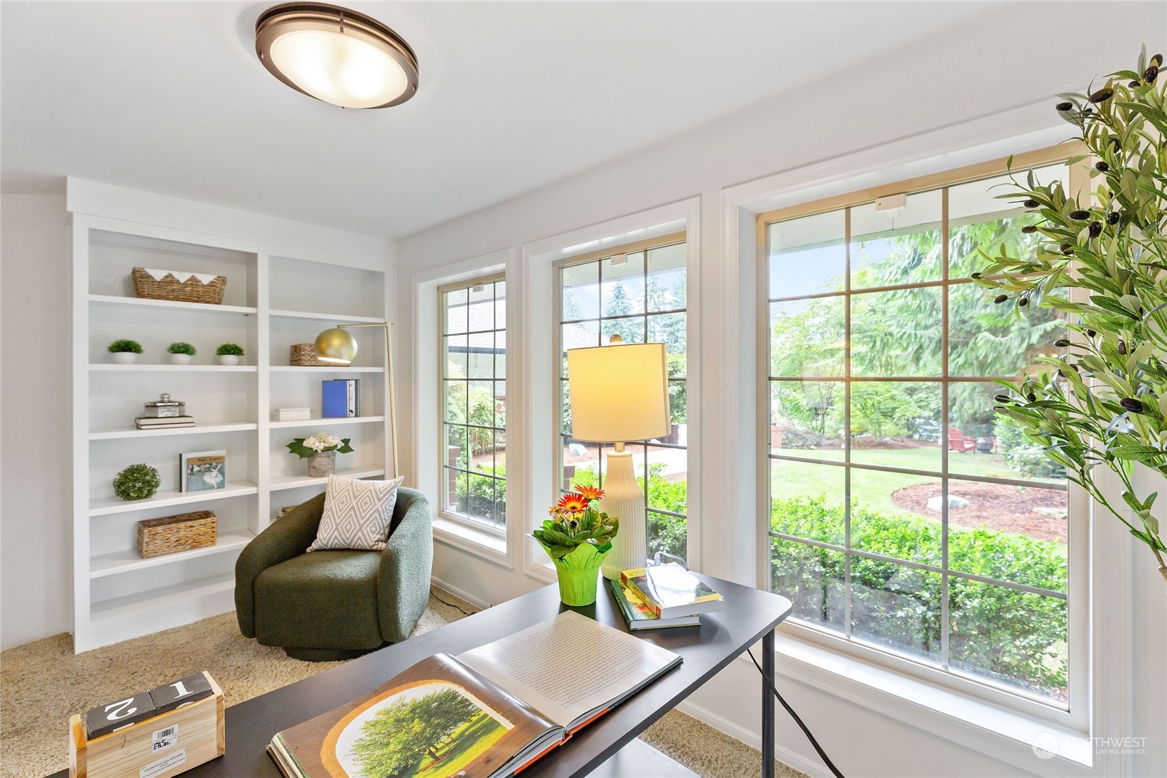 21020 49th Avenue Southeast Bothell, WA 98021 - Photo 7 of 39 a living room with furniture and a floor to ceiling window