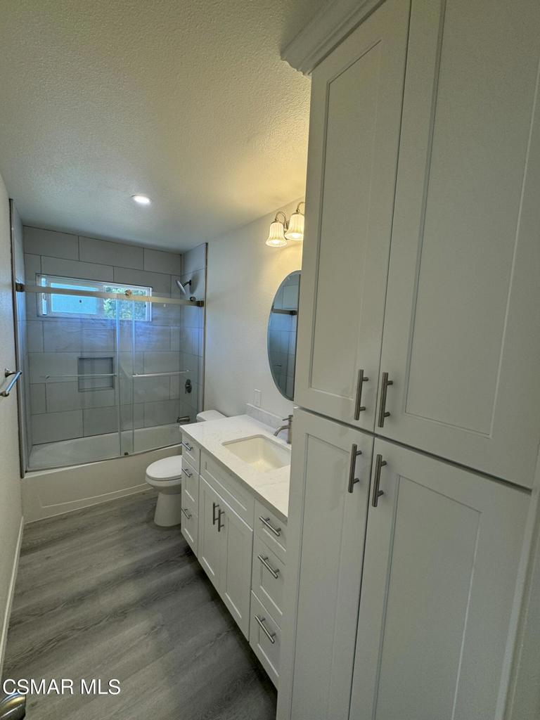 1769 Sitka Avenue Simi Valley, CA 93063 - Photo 5 of 11 a bathroom with a double vanity sink toilet and shower