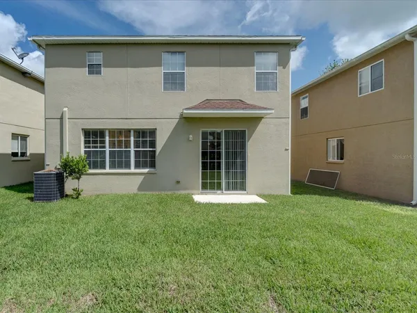 a view of a house with a garden