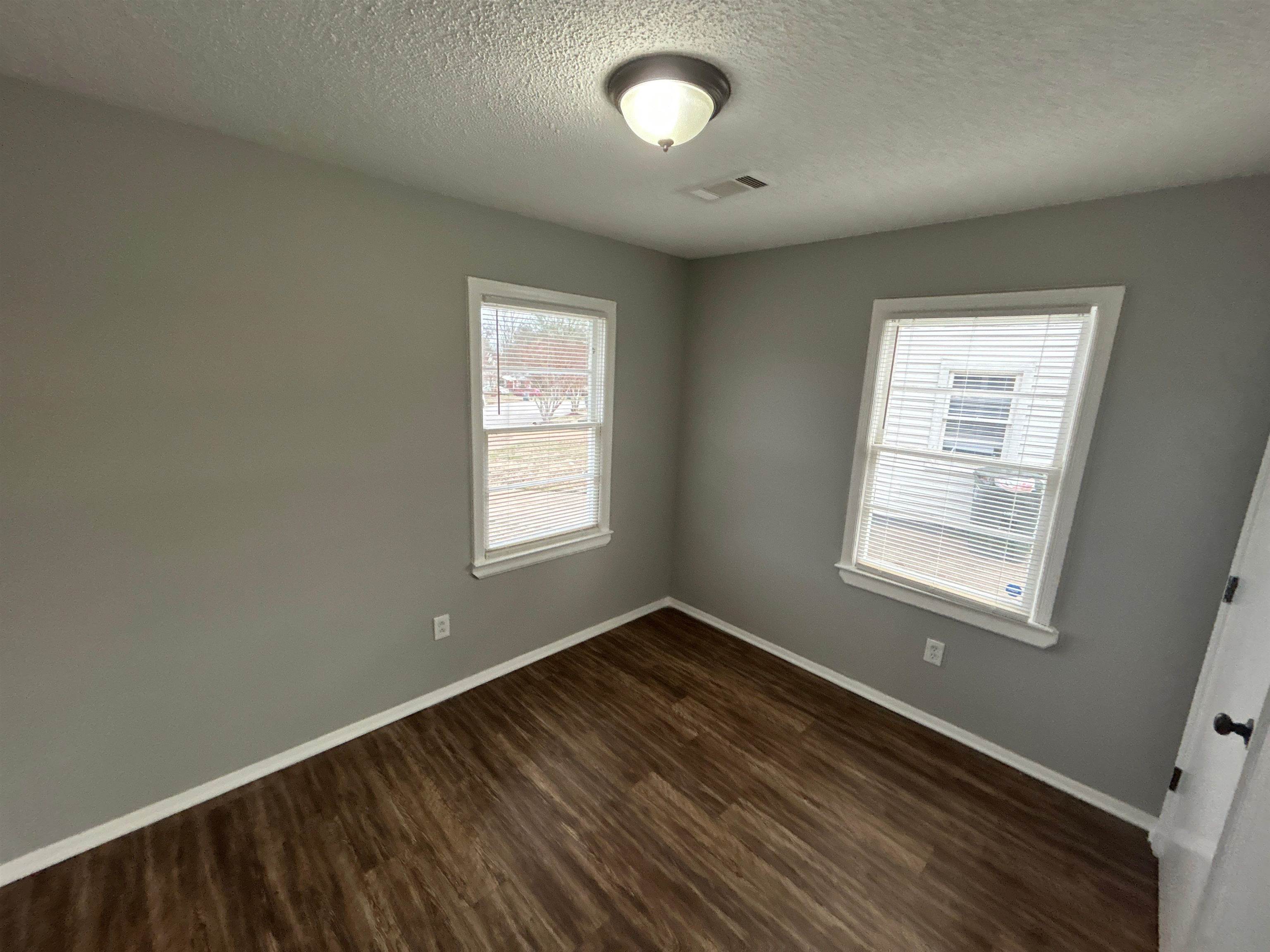 3509 Brantley Road Memphis, TN 38109 - Photo 3 of 9 an empty room with a window